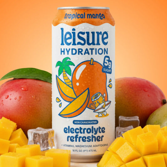 Leisure Hydration tropical mango electrolyte refresher can with mangoes and fruit pieces on an orange background